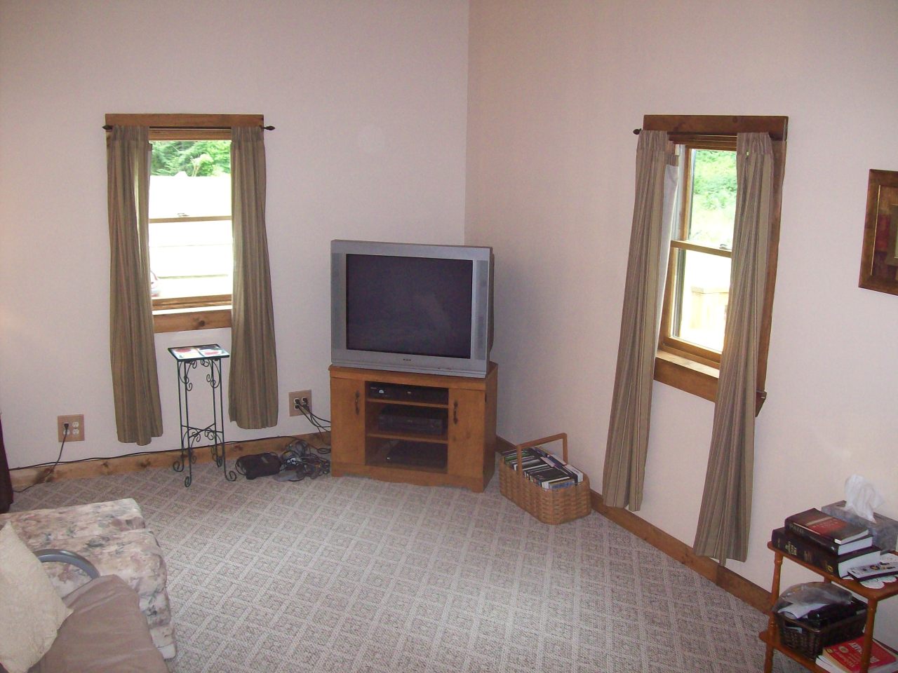 496 Dimmock Road Otis, MA 01253 - Photo 8 of 22 a room with a bed and a flat screen tv