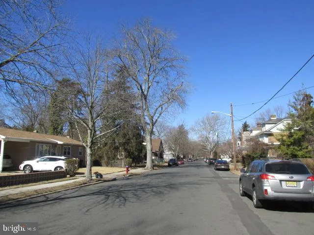 a view of a city street from a building