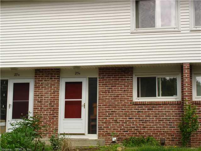 25 Anton Road, Unit C Mansfield, CT 06268 - Photo 1 of 1 a view of a windows and small yard
