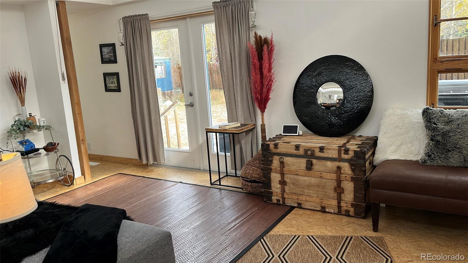 847 Airport Road Breckenridge, CO 80424 - Photo 14 of 24 a living room with furniture and a wooden floor