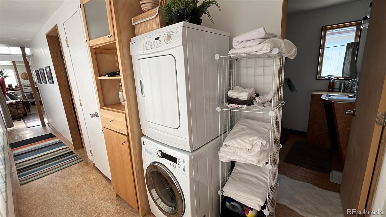847 Airport Road Breckenridge, CO 80424 - Photo 10 of 24 a view of a hallway with washer and dryer