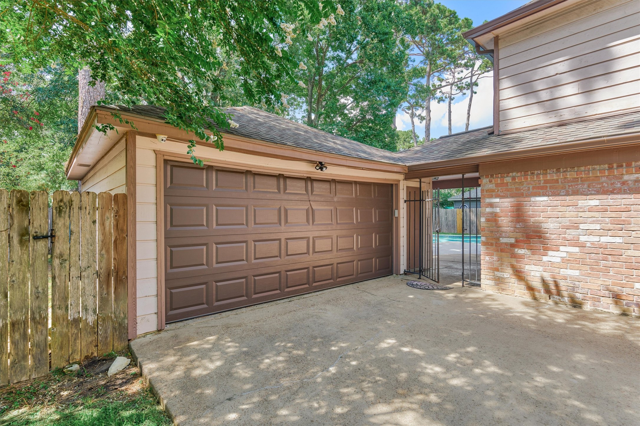 6522 Castle Pine Lane Spring, TX 77379 - Photo 45 of 49 a view of a house with a small yard and a large tree