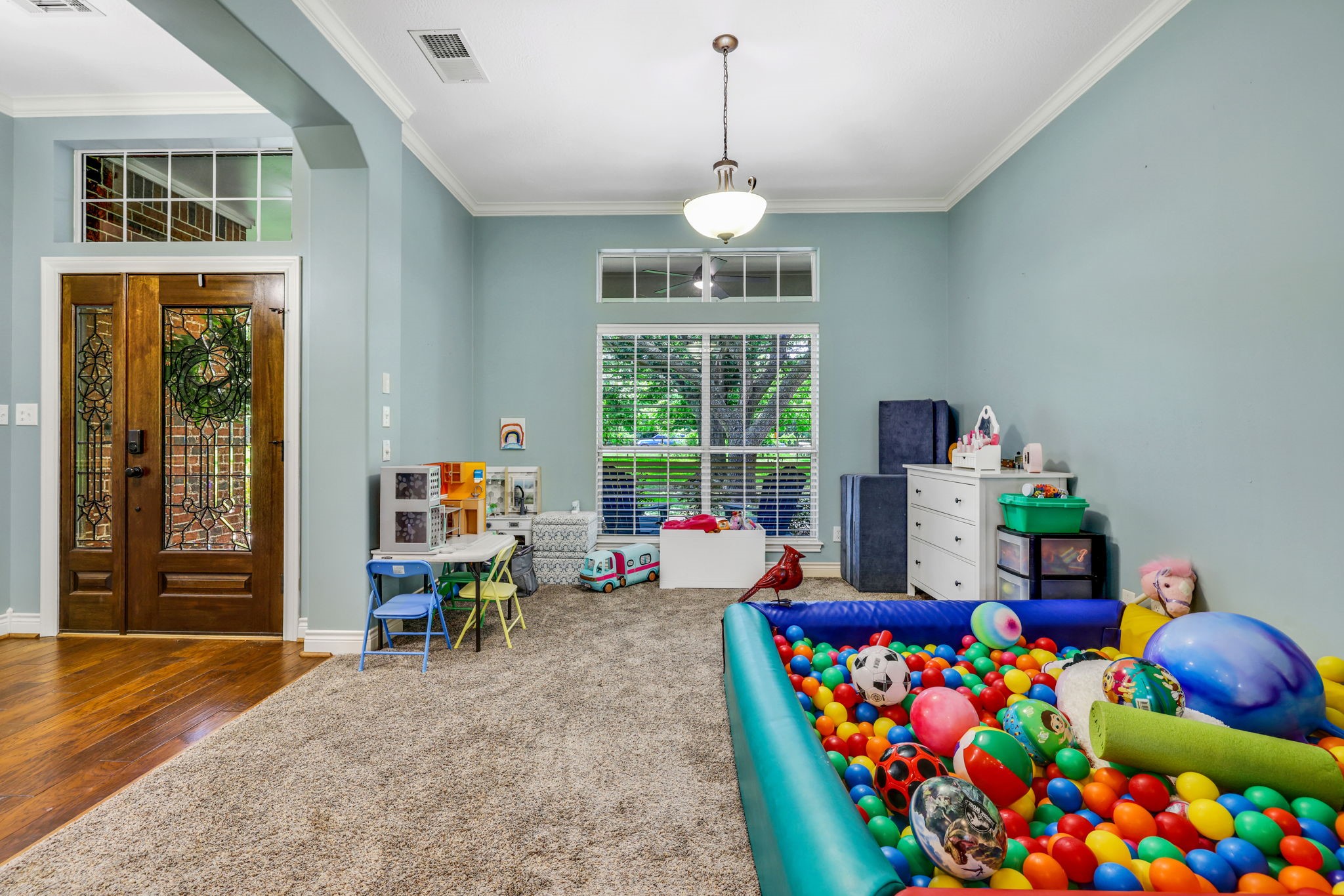 19407 Pine Tree Lane Waller, TX 77484 - Photo 13 of 39 a living room filled with furniture and a window