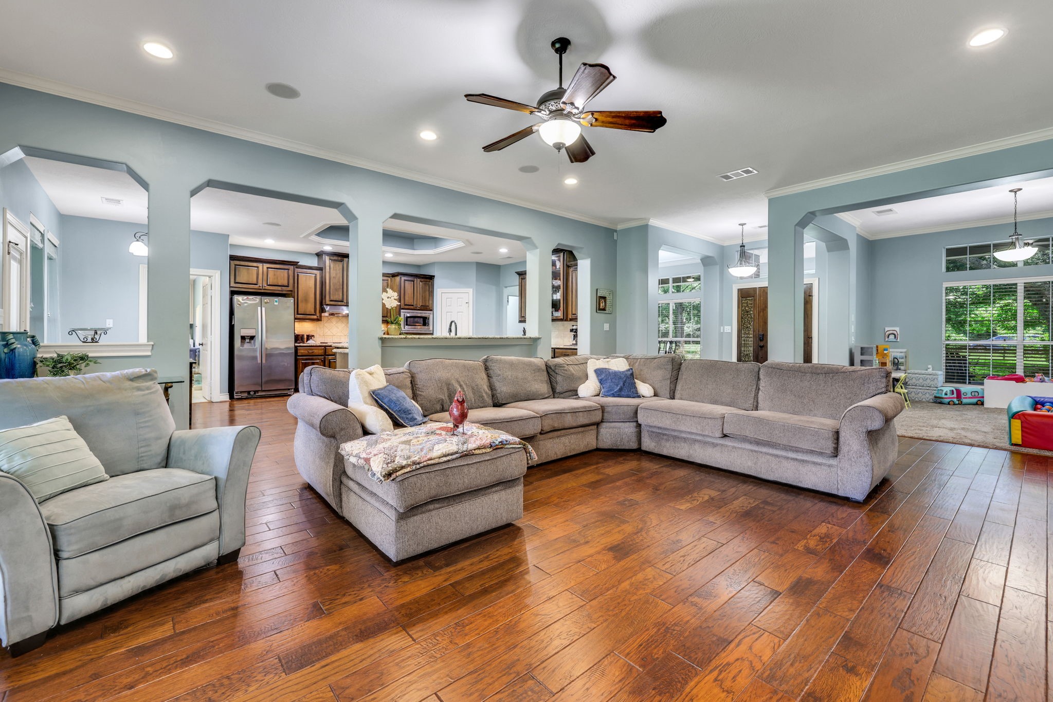 19407 Pine Tree Lane Waller, TX 77484 - Photo 38 of 39 a living room with furniture and a large window