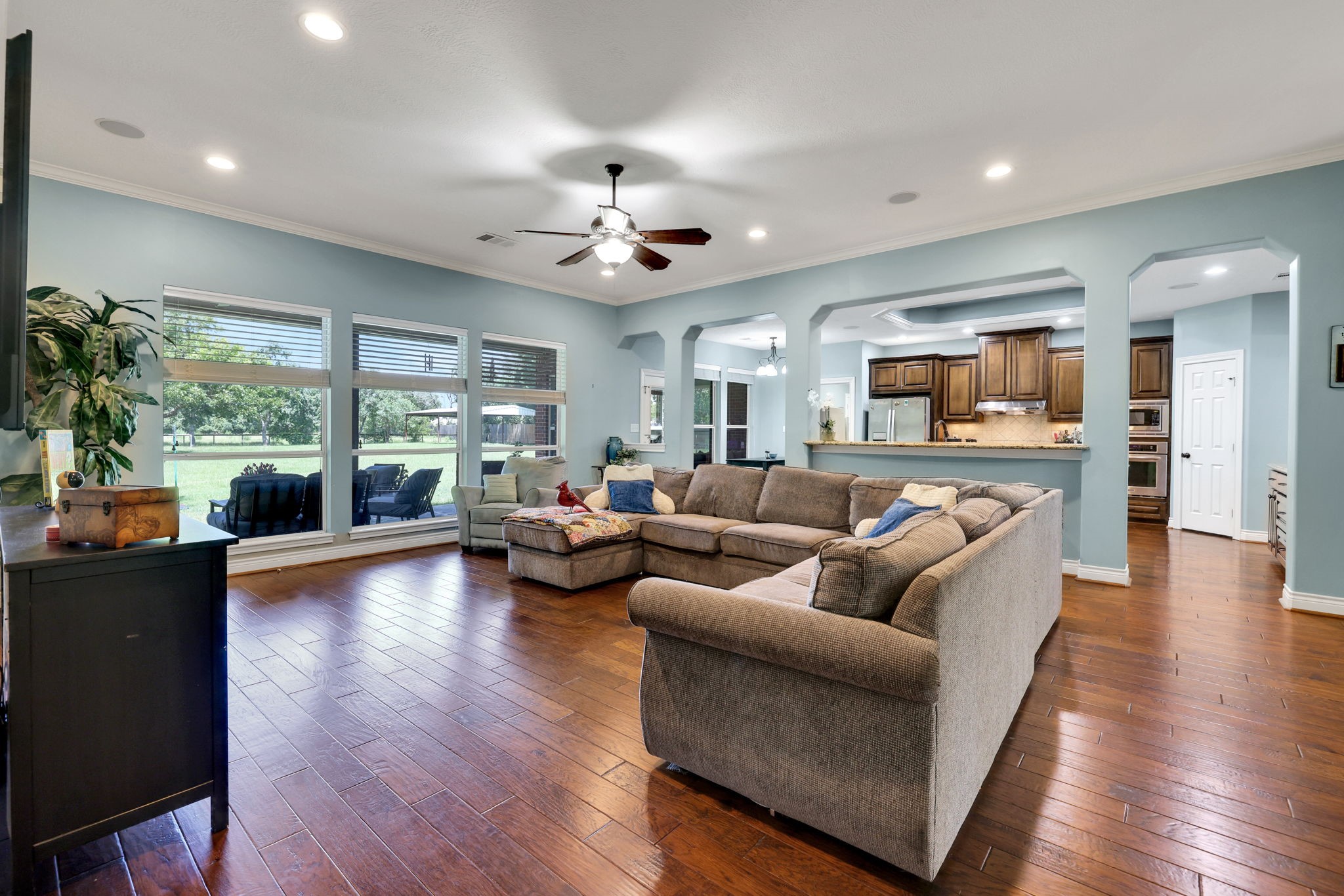 19407 Pine Tree Lane Waller, TX 77484 - Photo 15 of 39 a living room with furniture and a large window