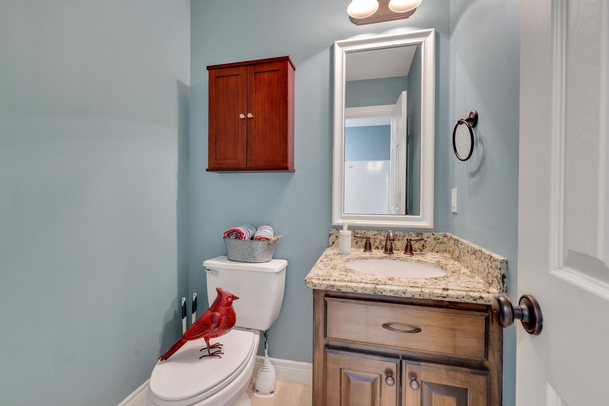 19407 Pine Tree Lane Waller, TX 77484 - Photo 21 of 39 a bathroom with a sink vanity mirror and toilet