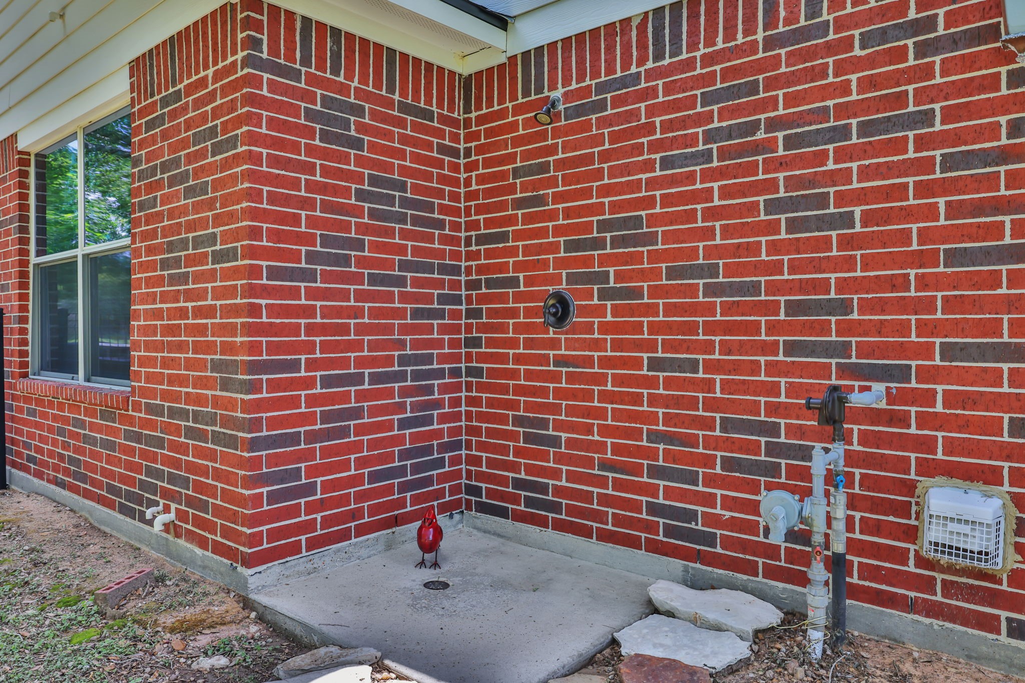 19407 Pine Tree Lane Waller, TX 77484 - Photo 33 of 39 a view of a brick building with many windows