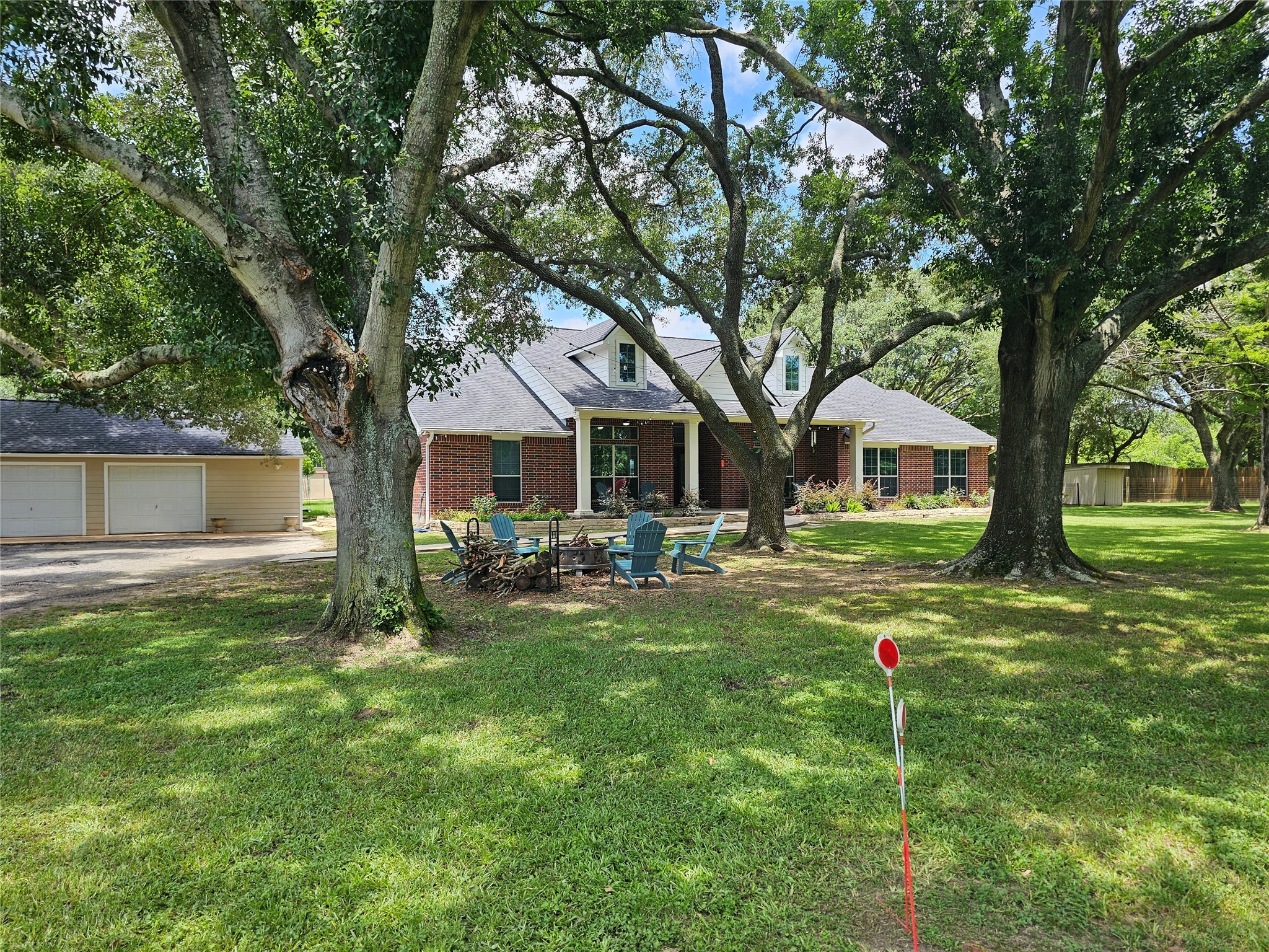 19407 Pine Tree Lane Waller, TX 77484 - Photo 7 of 39 a front view of a house with yard and green space