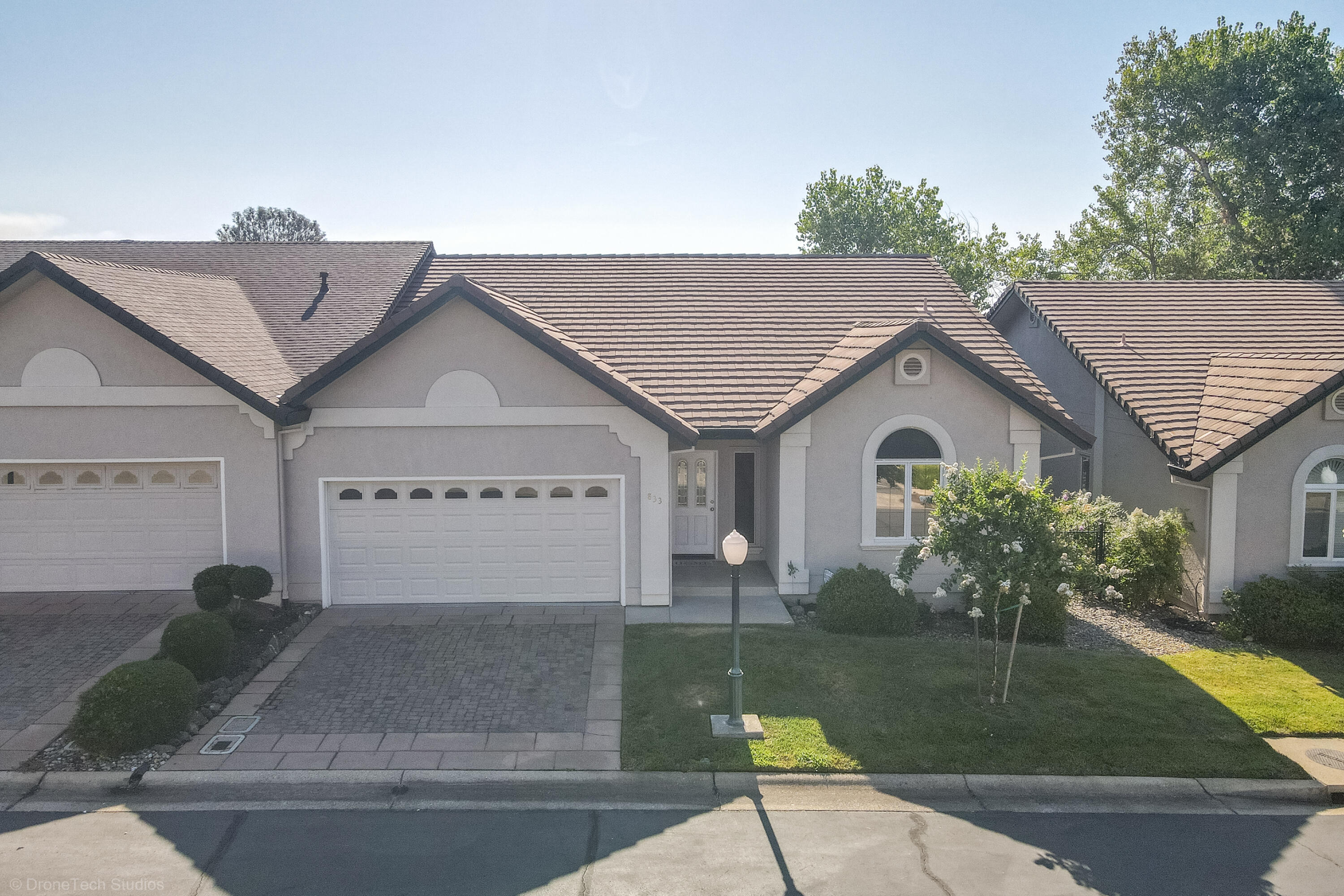 833 Cherryhill Trail Redding, CA 96003 - Photo 1 of 42 a view of a house with a garden
