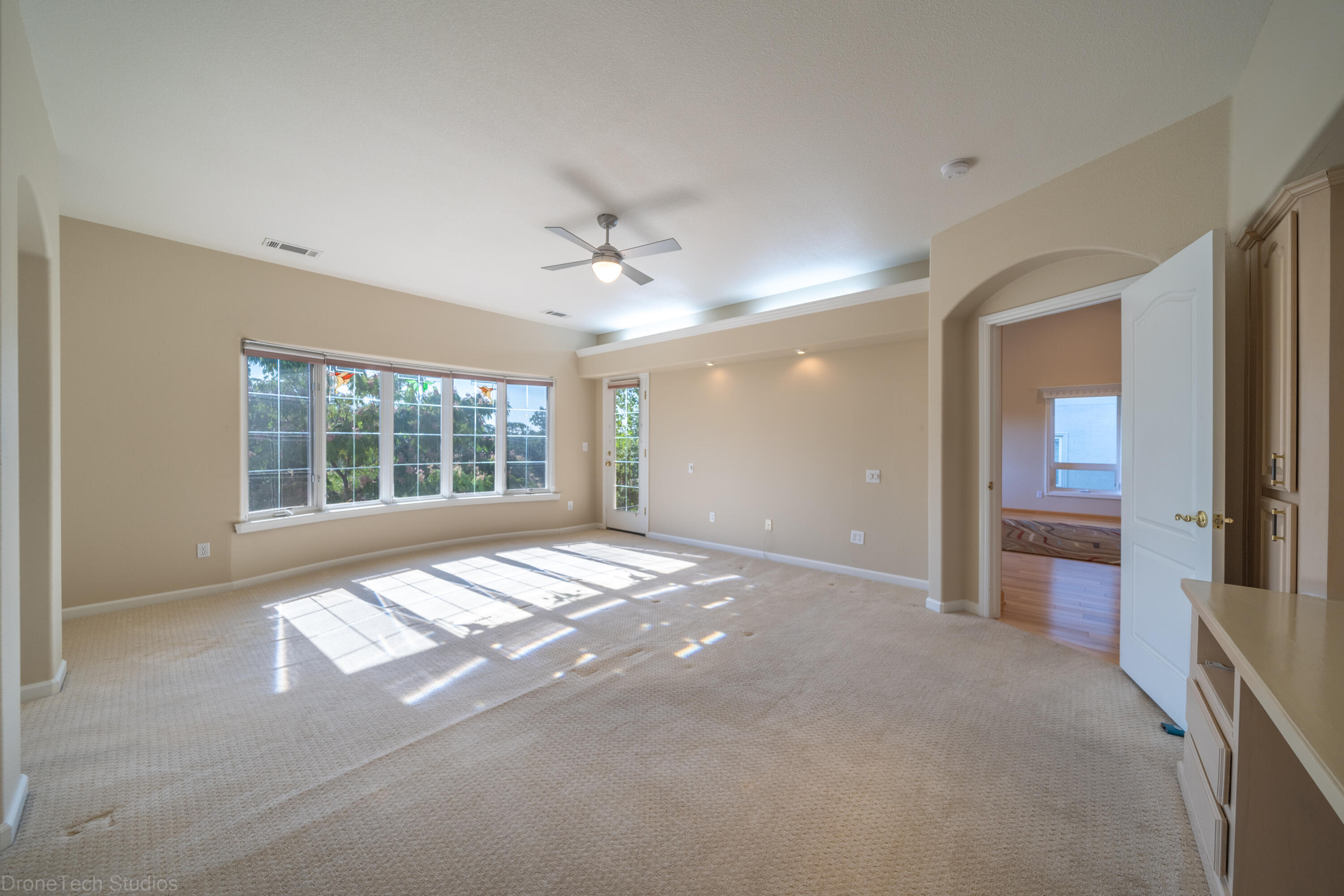 833 Cherryhill Trail Redding, CA 96003 - Photo 21 of 42 a view of an empty room with a window