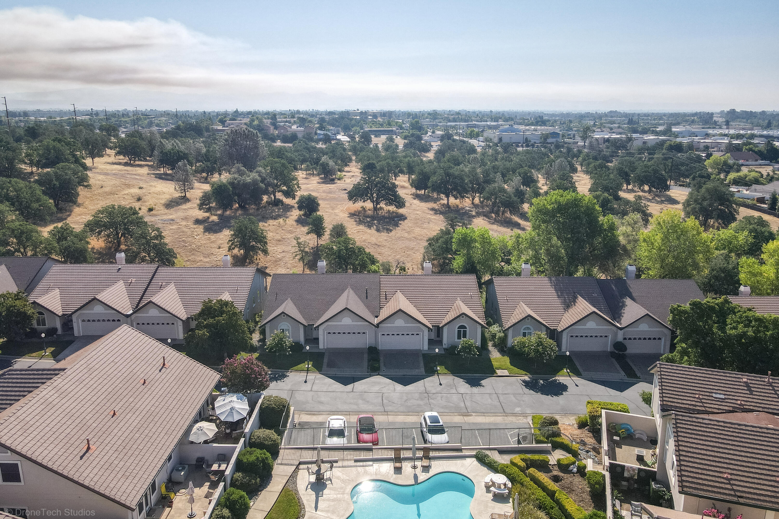 833 Cherryhill Trail Redding, CA 96003 - Photo 35 of 42 an aerial view of residential houses with outdoor space