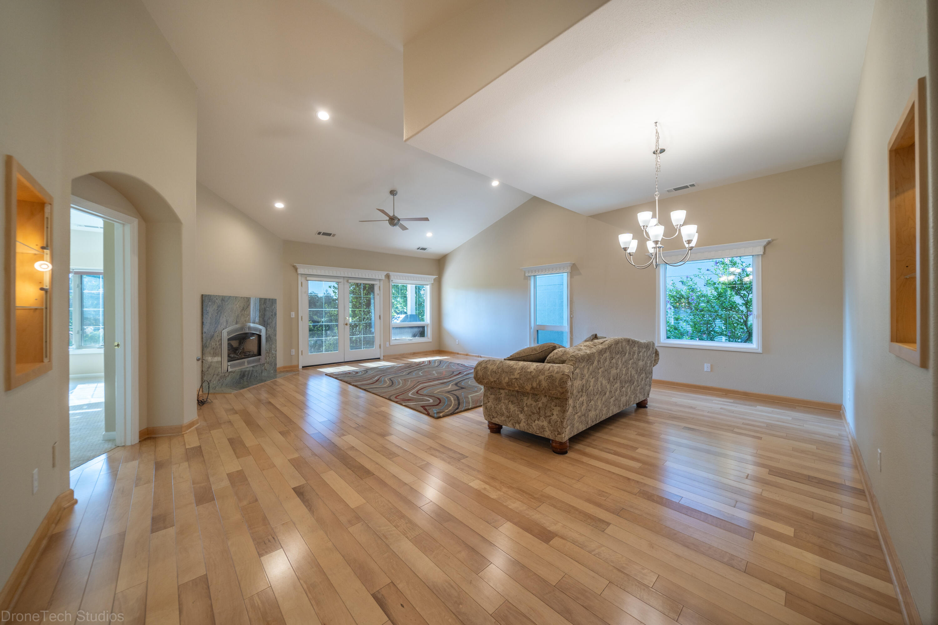 833 Cherryhill Trail Redding, CA 96003 - Photo 4 of 42 a large living room with a large window