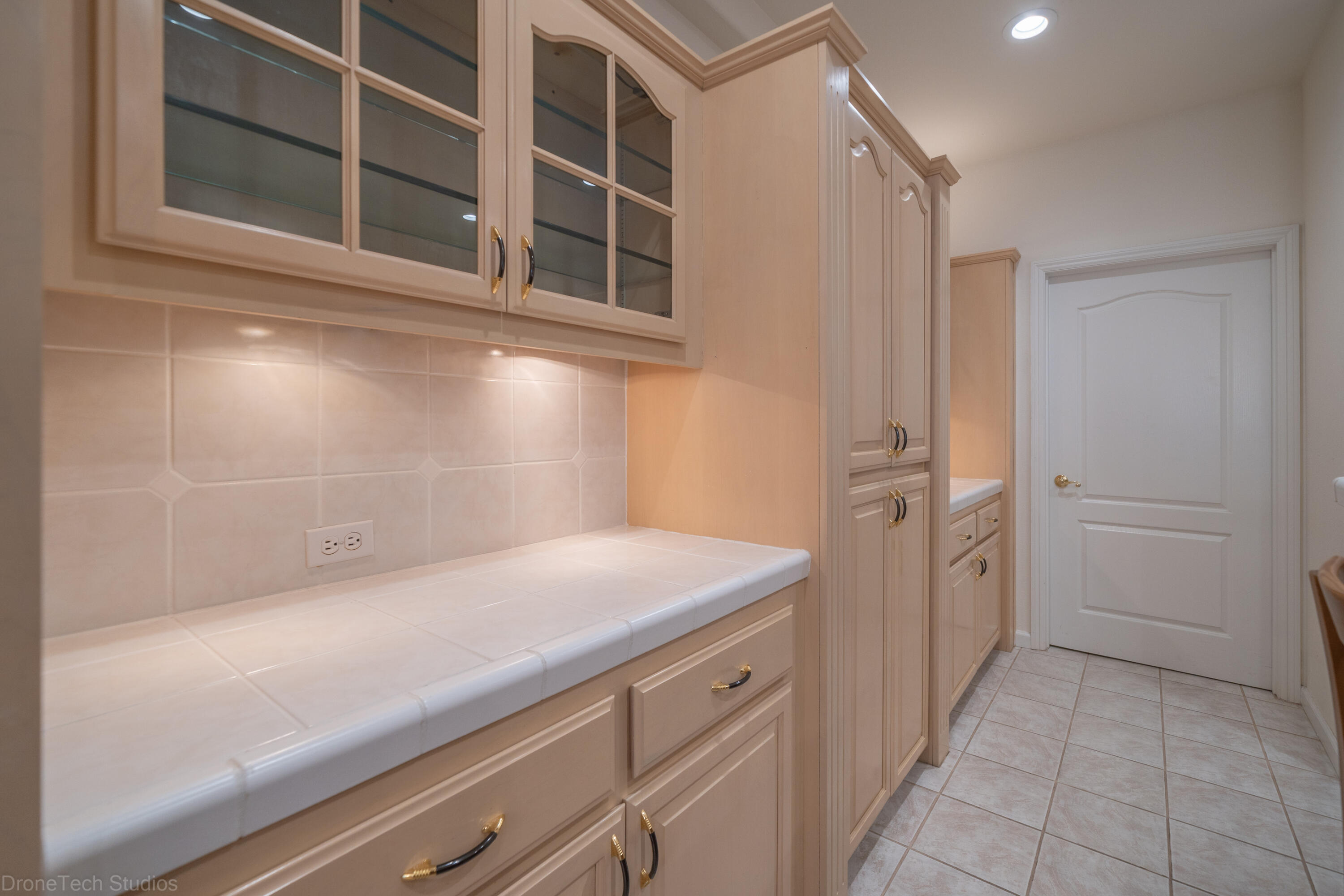 833 Cherryhill Trail Redding, CA 96003 - Photo 10 of 42 a view of a kitchen with white cabinets