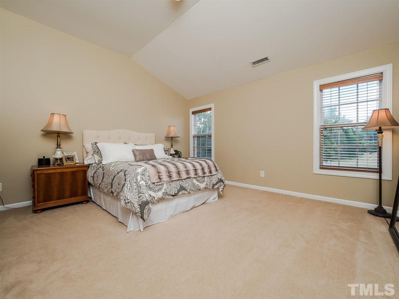 3005 Imperial Oaks Drive Raleigh, NC 27614 - Photo 15 of 25 a bedroom with a bed and a window