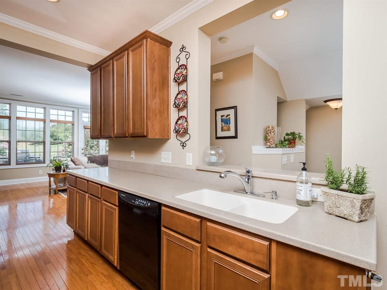 3005 Imperial Oaks Drive Raleigh, NC 27614 - Photo 5 of 25 a kitchen with a sink and cabinets