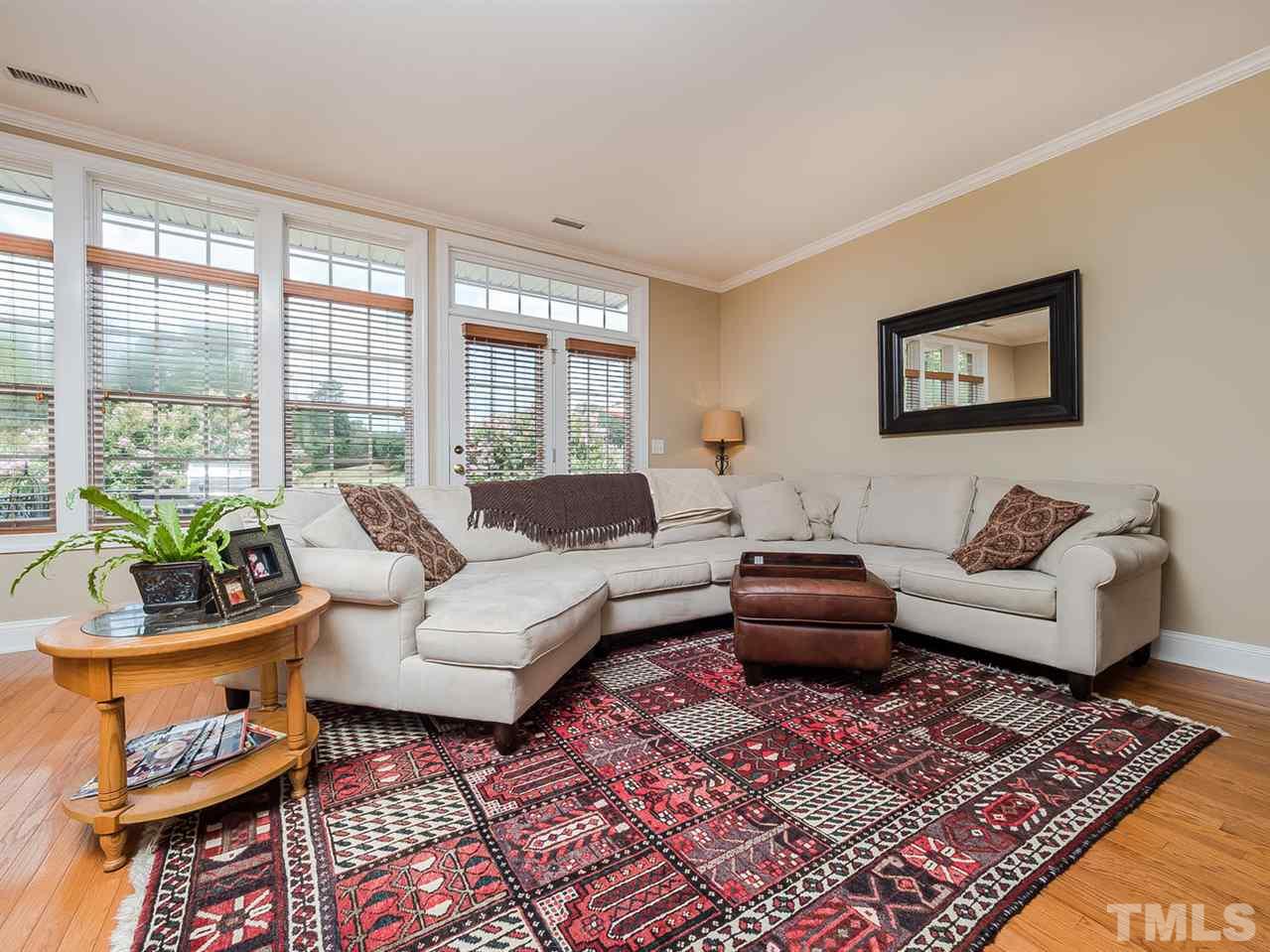 3005 Imperial Oaks Drive Raleigh, NC 27614 - Photo 10 of 25 a living room with furniture and a rug