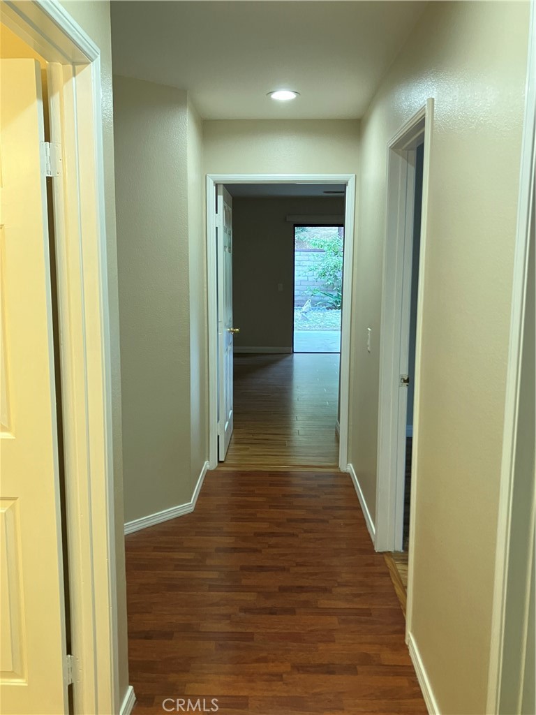 19933 Ralph Street Walnut, CA 91789 - Photo 43 of 77 a view of a hallway with wooden floor