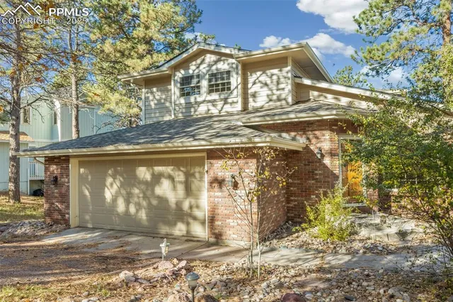 a view of entrance gate of a house