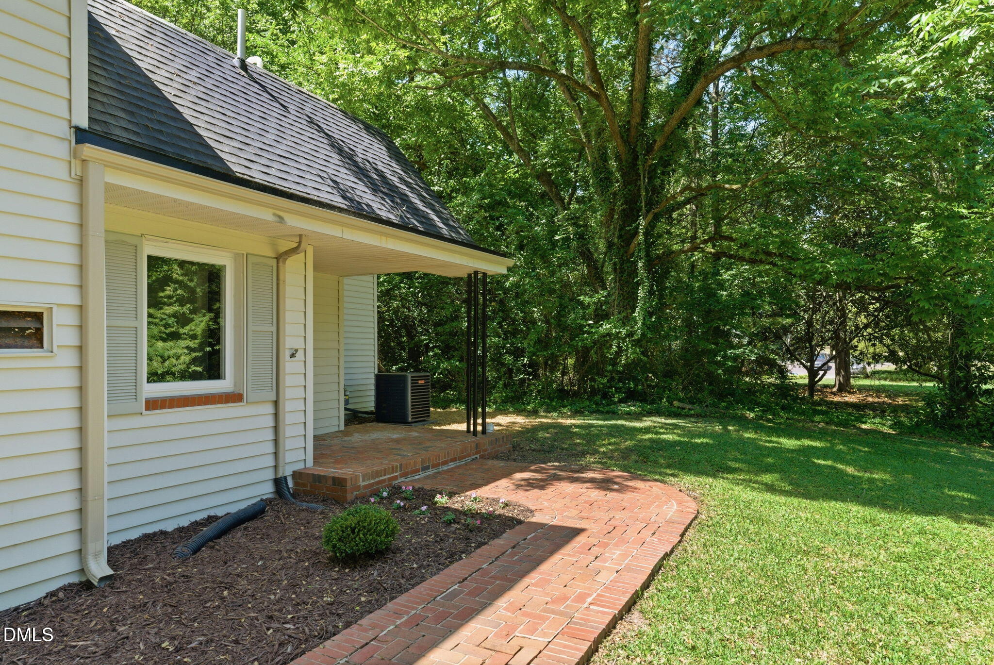 1615 Carbonton Road Sanford, NC 27330 - Photo 6 of 49 a view of a backyard with a garden