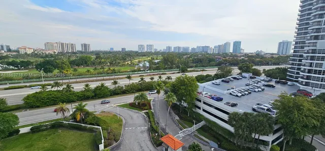 a view of a city with tall buildings
