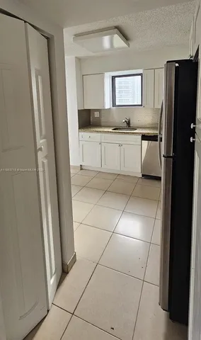 a view of a storage & utility room with washer and dryer