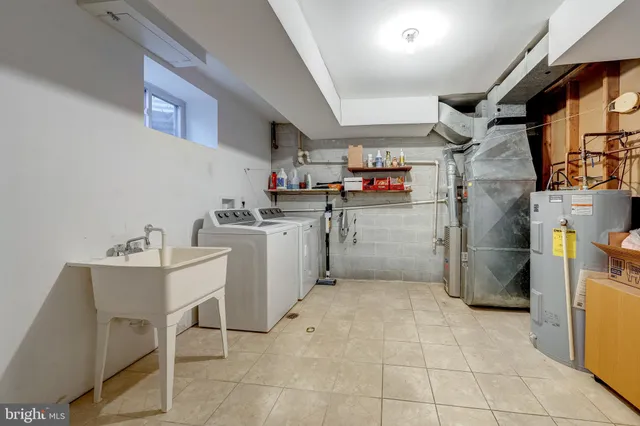 a storage room with washer and dryer