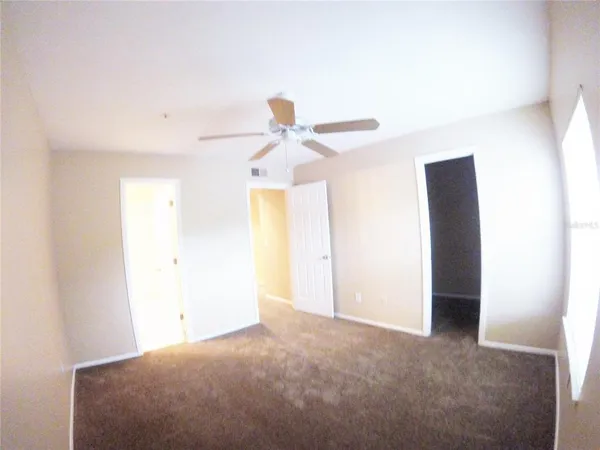 a view of a room with racks on the wall