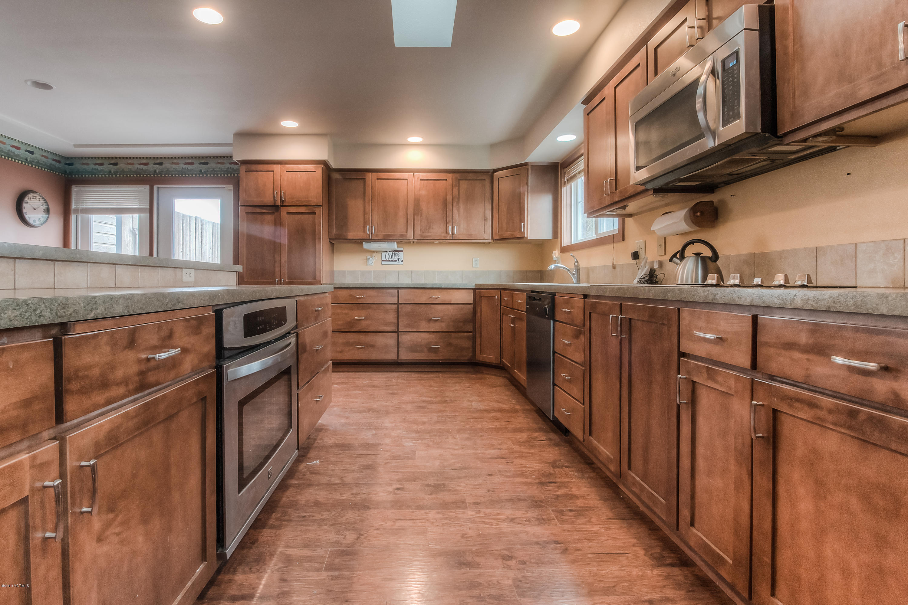 111 Beam Road Granger, WA 98932 - Photo 1 of 27 a kitchen with stainless steel appliances granite countertop a stove and cabinets