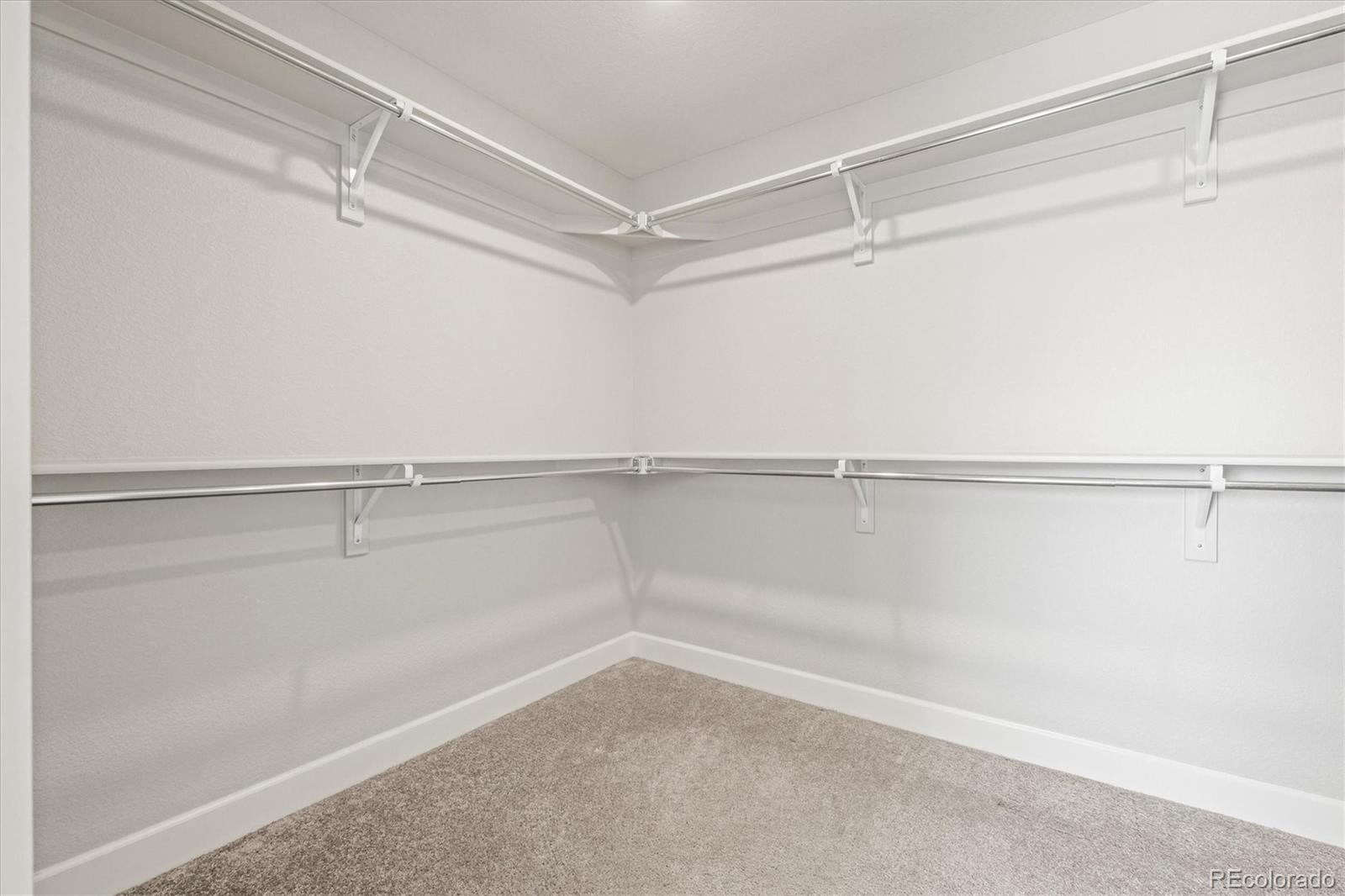 1624 Pinion Wing Circle Castle Rock, CO 80108 - Photo 29 of 47 a view of a room with racks on the wall