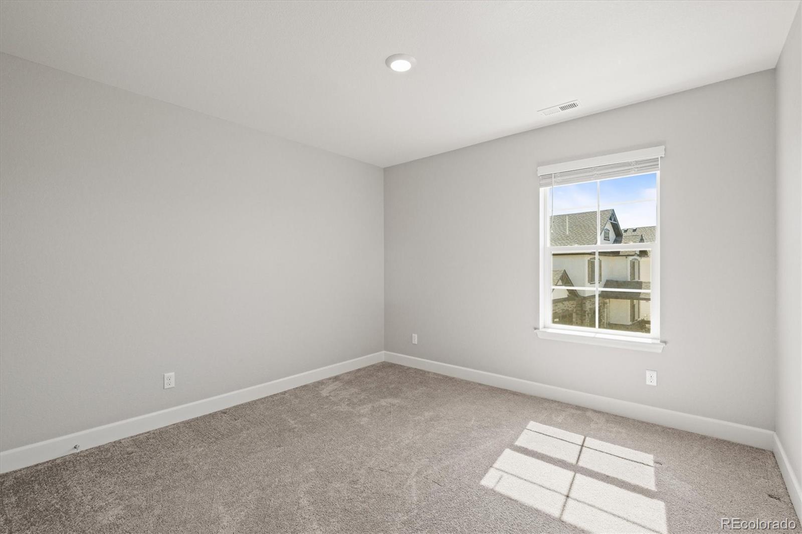 1624 Pinion Wing Circle Castle Rock, CO 80108 - Photo 35 of 47 an empty room with a window