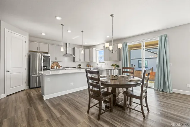 a spacious bedroom with a bed and a window