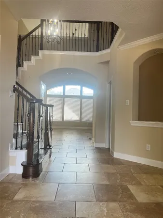a view of a hallway with entryway