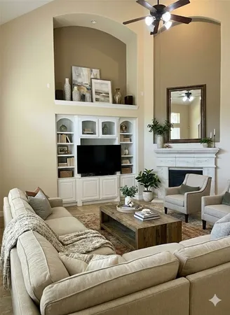 a living room with furniture and a fireplace