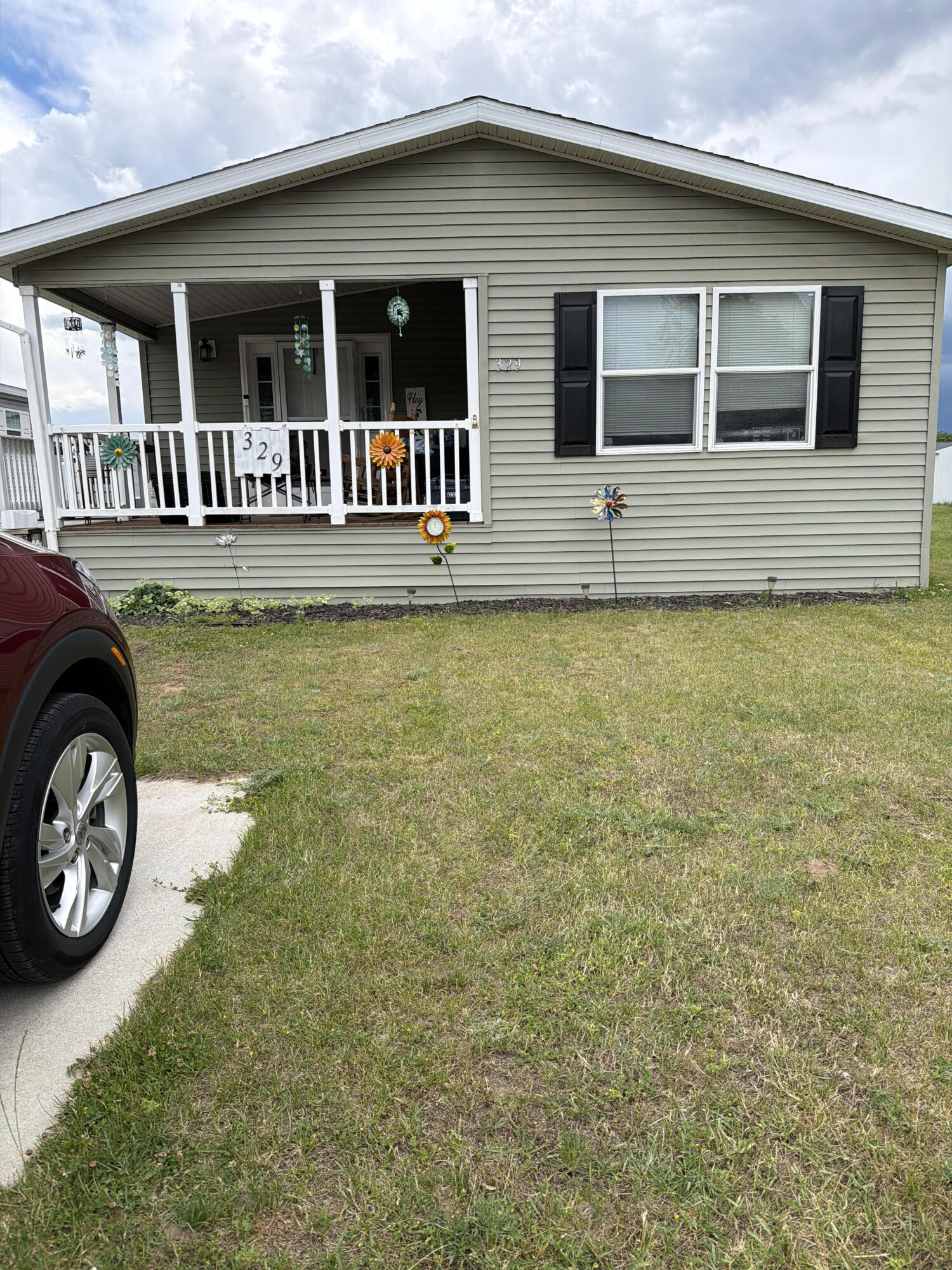 360 East Tuttle Road, Unit 329 Ionia, MI 48846 - Photo 1 of 1 Front