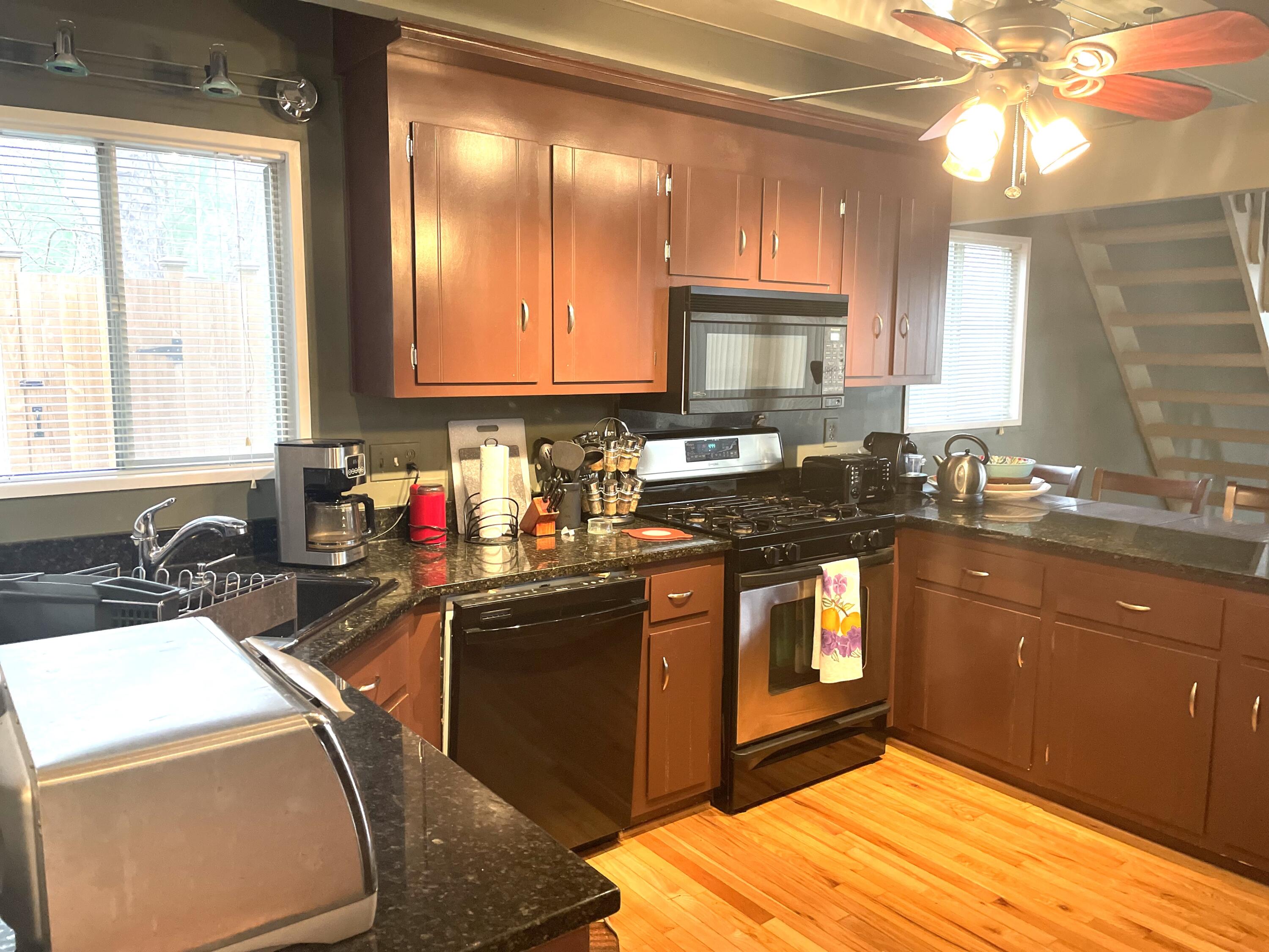 1 Summersea Road Mashpee, MA 02649 - Photo 16 of 34 a kitchen with a sink appliances and cabinets