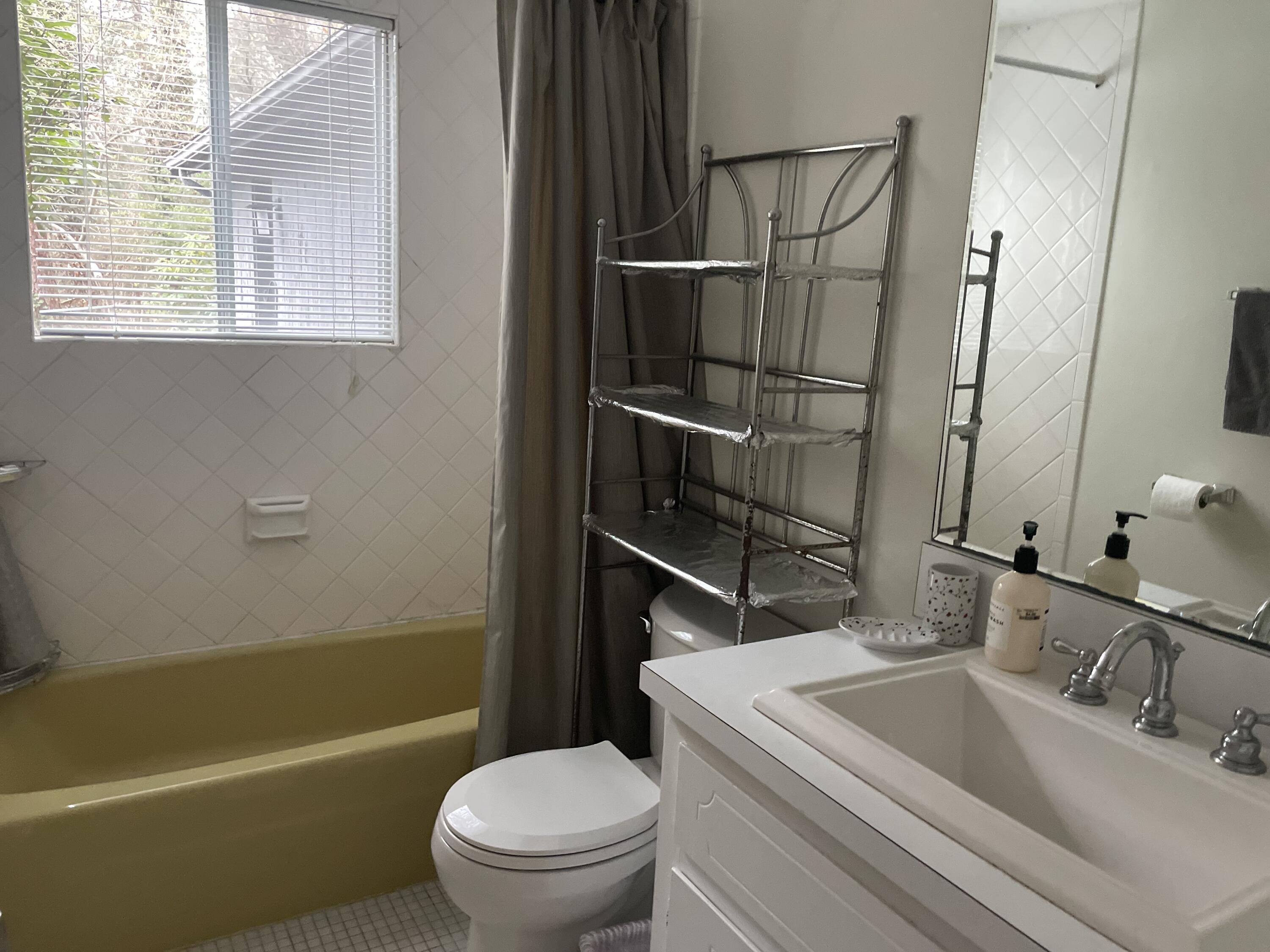 1 Summersea Road Mashpee, MA 02649 - Photo 23 of 34 a bathroom with a sink a toilet and shower