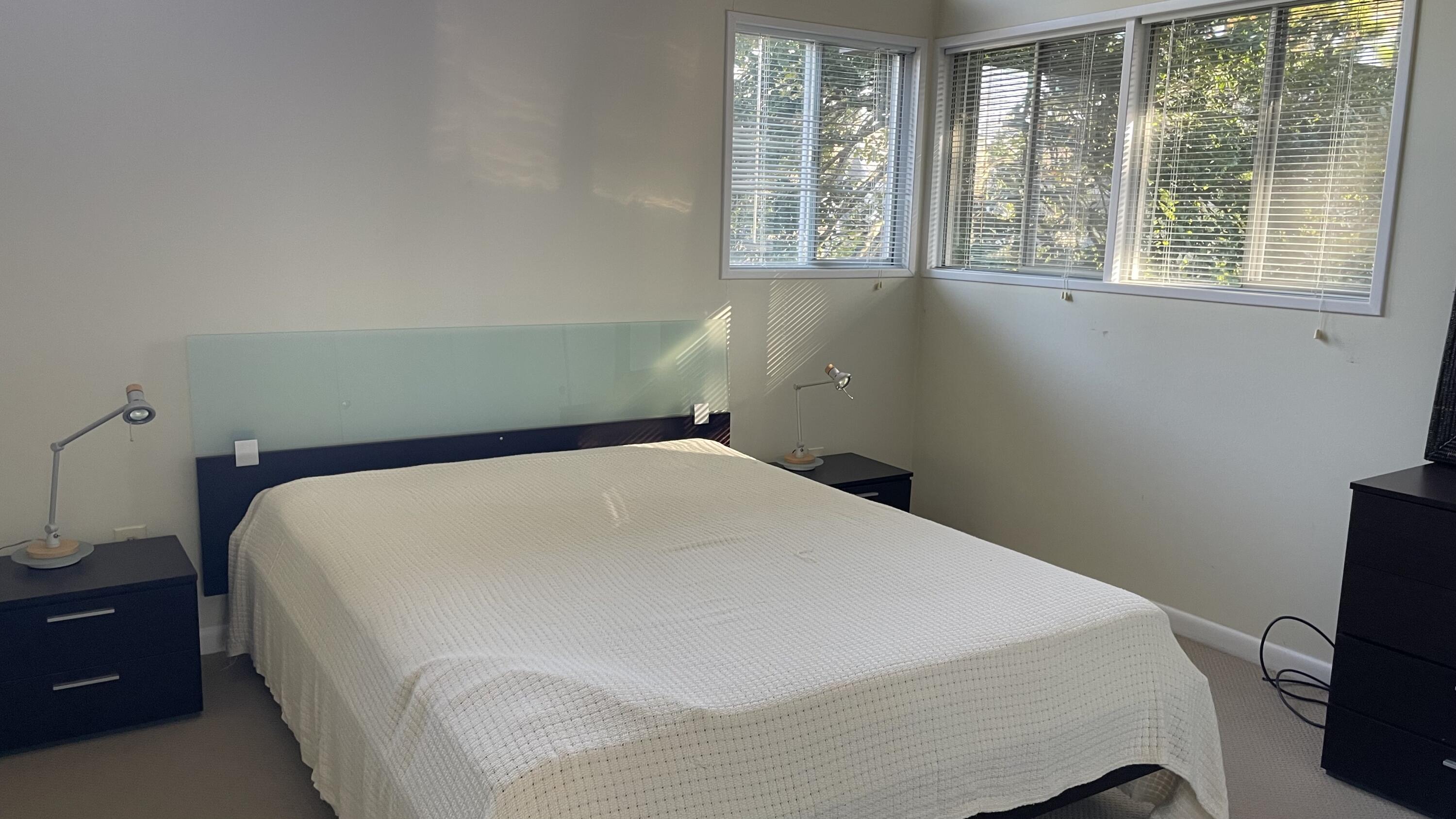 1 Summersea Road Mashpee, MA 02649 - Photo 26 of 34 a bed sitting in a bedroom next to a window