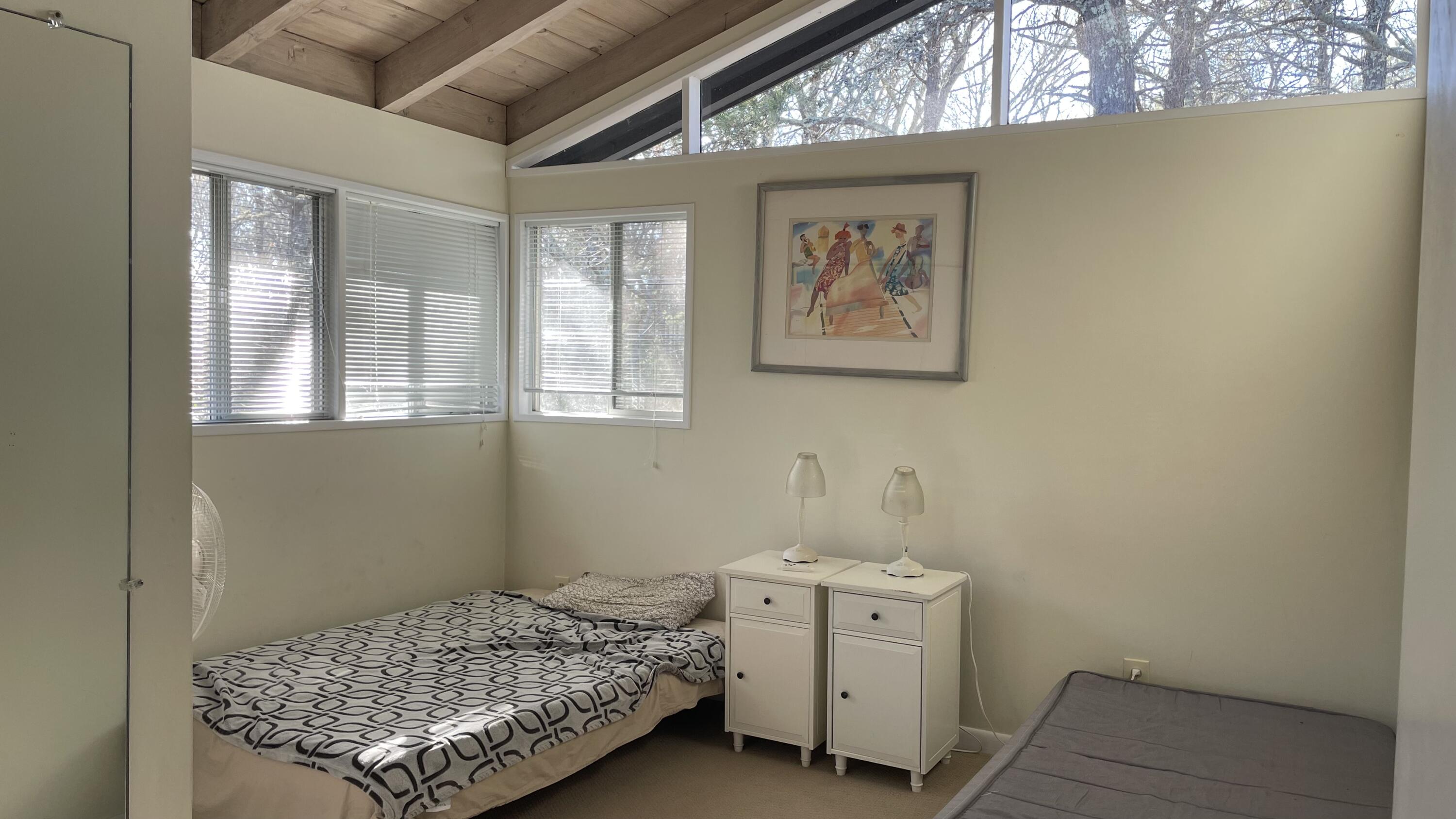1 Summersea Road Mashpee, MA 02649 - Photo 28 of 34 a room with a baby bed dresser and a window