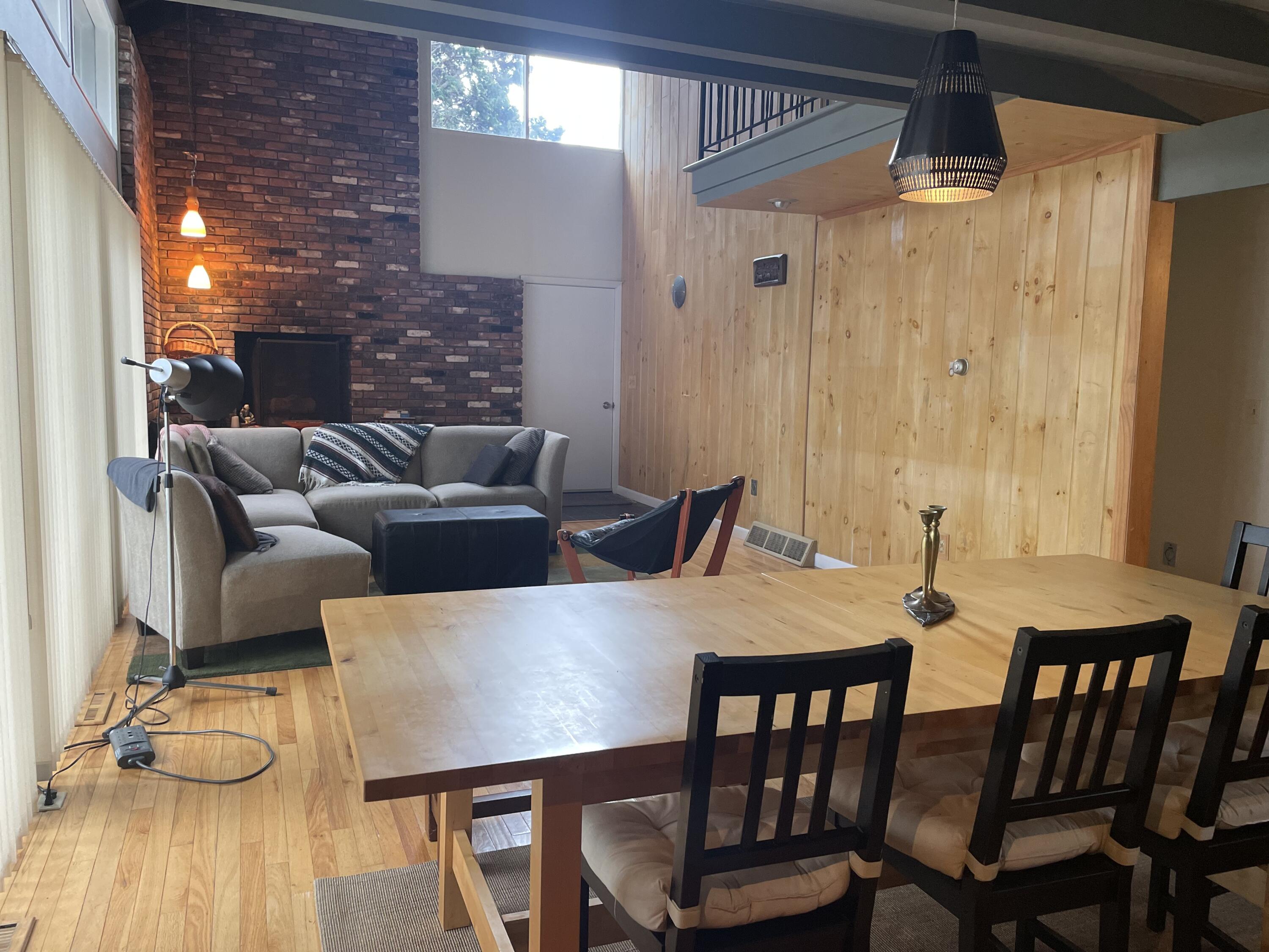 1 Summersea Road Mashpee, MA 02649 - Photo 7 of 34 a view of a dining room with furniture and wooden floor