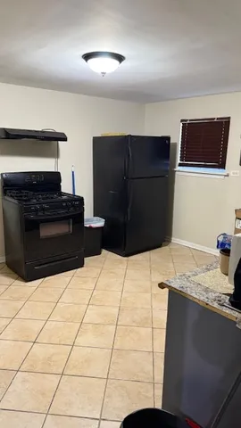 a living room with a dresser
