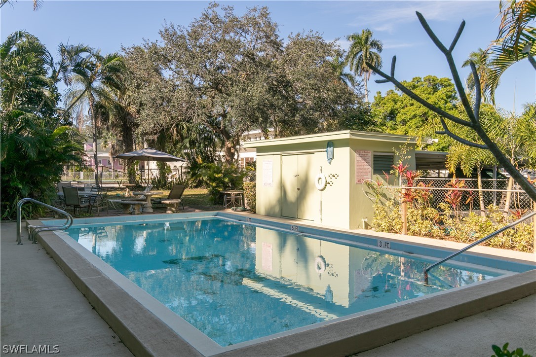 2544 First Street, Unit 201 Fort Myers, FL 33901 - Photo 17 of 19 swimming pool view from a balcony with seating space