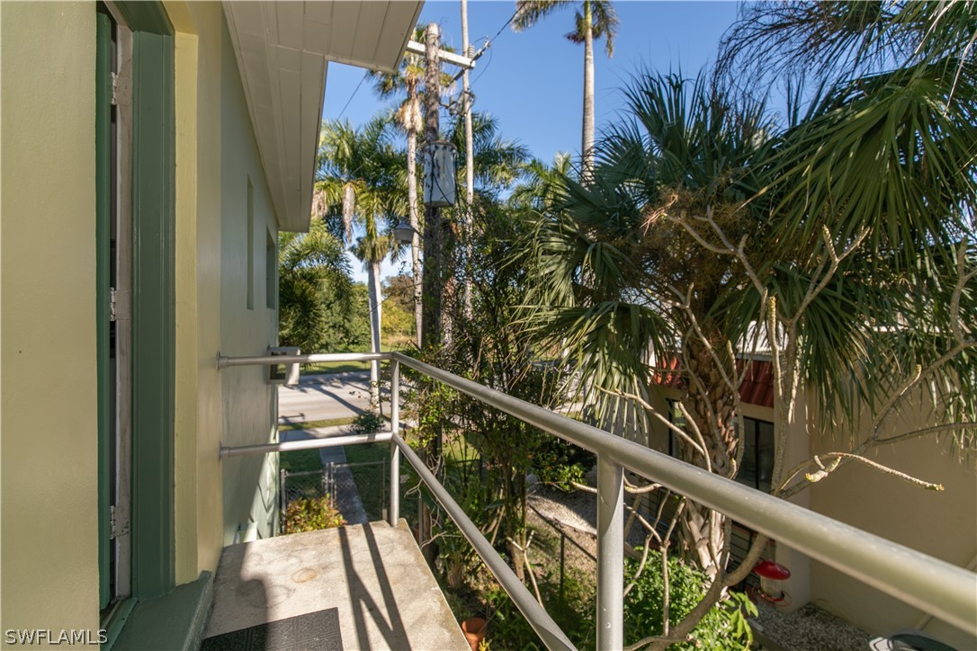2544 First Street, Unit 201 Fort Myers, FL 33901 - Photo 3 of 19 a view of balcony and wooden floor