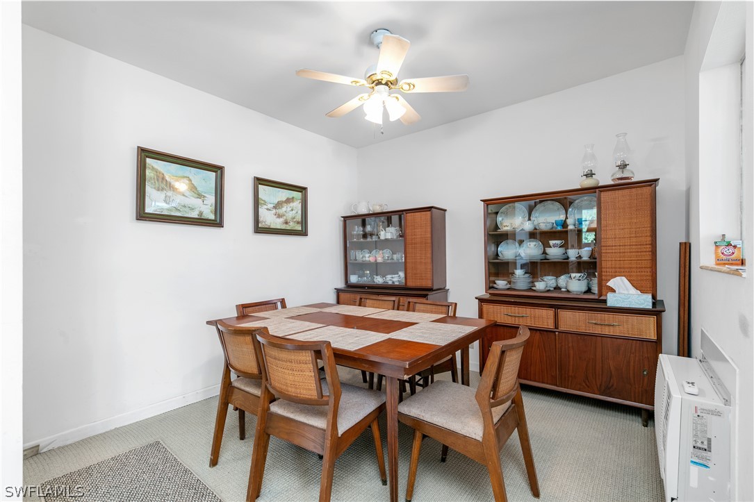 2544 First Street, Unit 201 Fort Myers, FL 33901 - Photo 7 of 19 a dining room with furniture and window