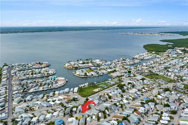 a view of swimming pool with outdoor seating and yard