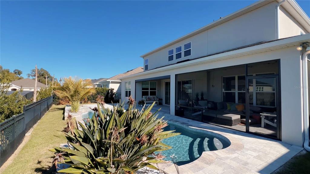 3383 Current Avenue Clermont, FL 34711 - Photo 35 of 53 a view of a chairs and table in a patio