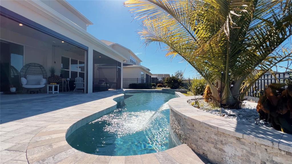 3383 Current Avenue Clermont, FL 34711 - Photo 37 of 53 a view of a house with couches in patio