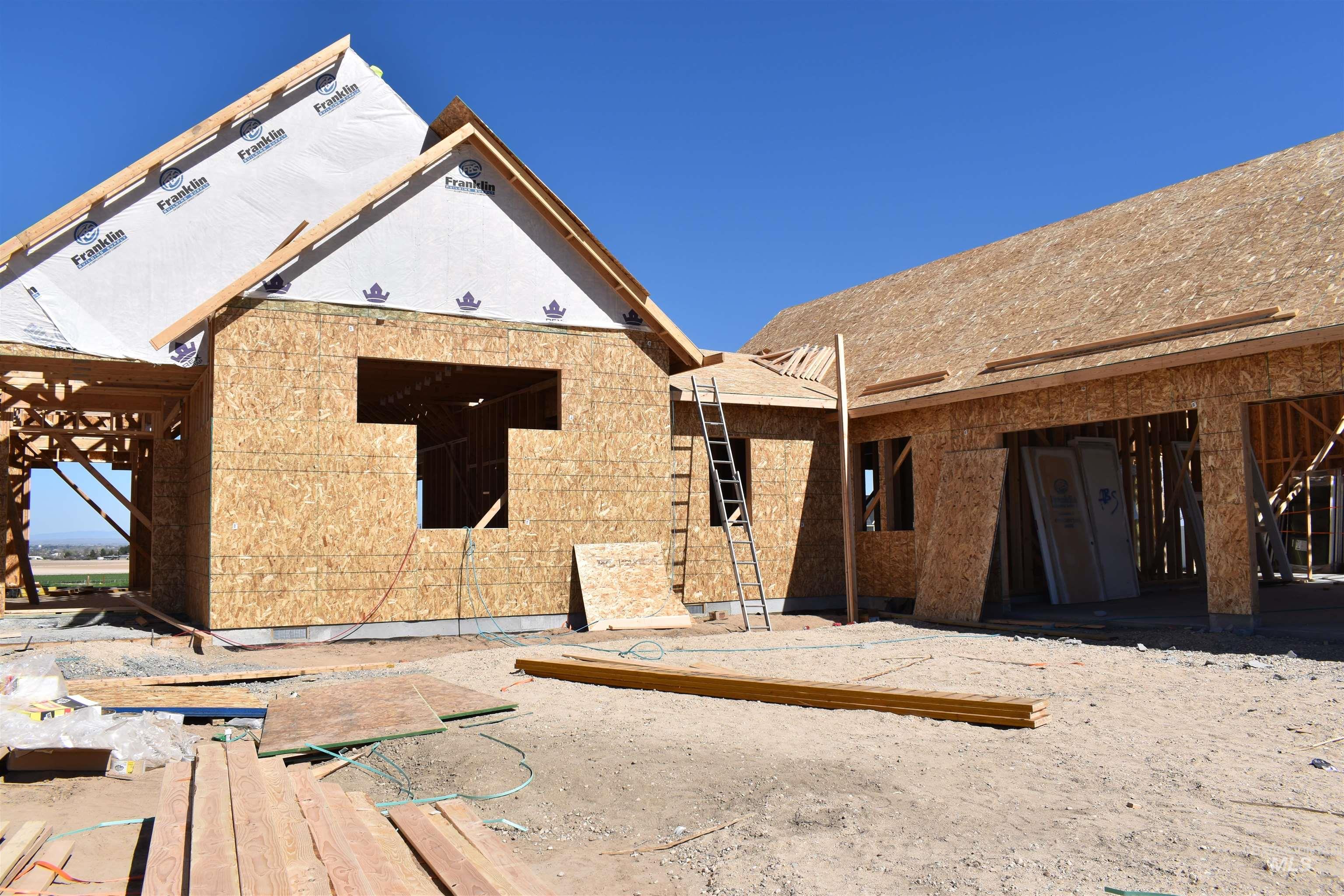 16908 Long Meadow Drive Caldwell, ID 83607 - Photo 4 of 5 View of front of home featuring a patio and a wooden deck