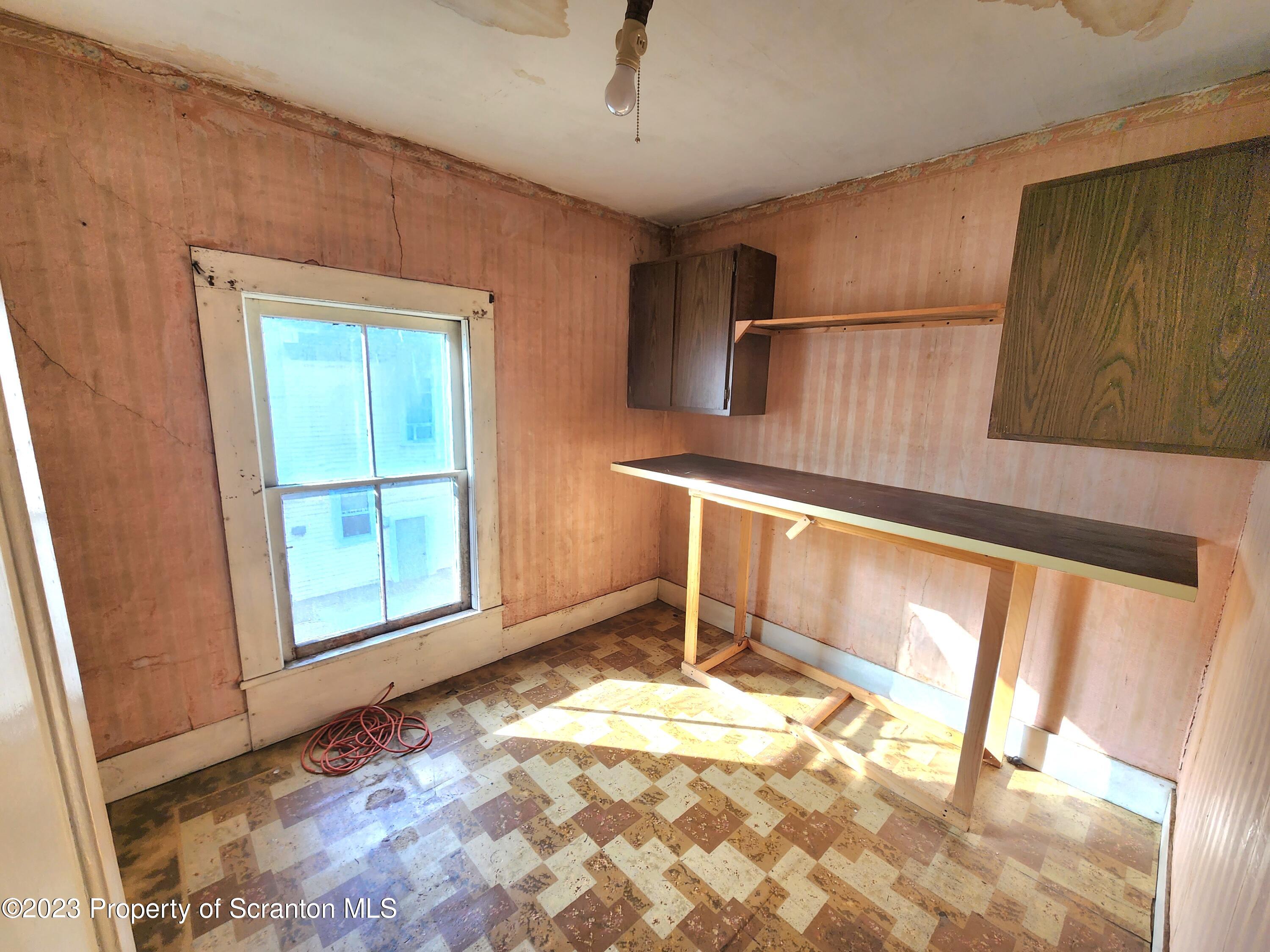 21 High Street Nicholson, PA 18446 - Photo 15 of 33 a view of an empty room with a window