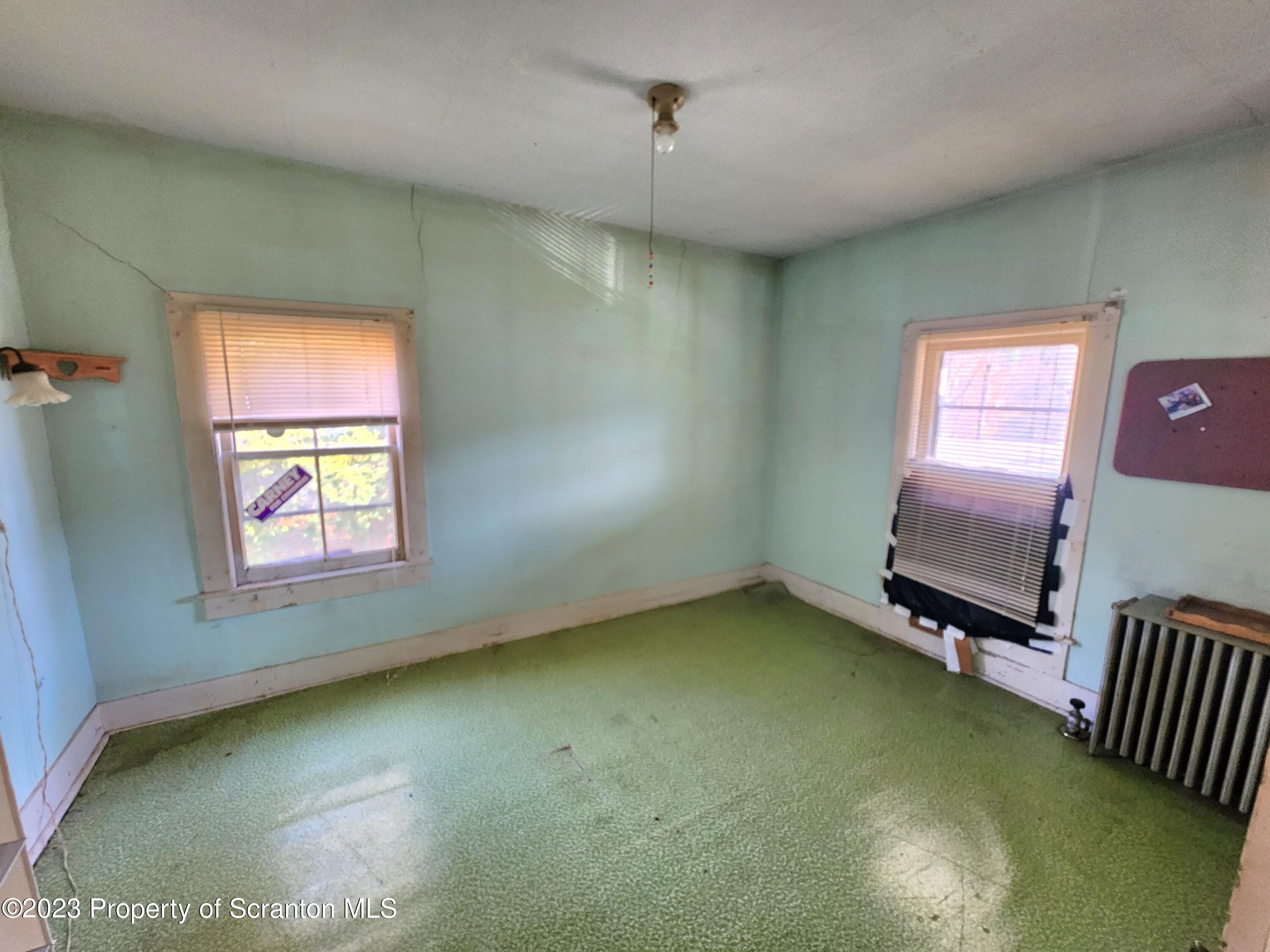 21 High Street Nicholson, PA 18446 - Photo 21 of 33 a view of an empty room with a window