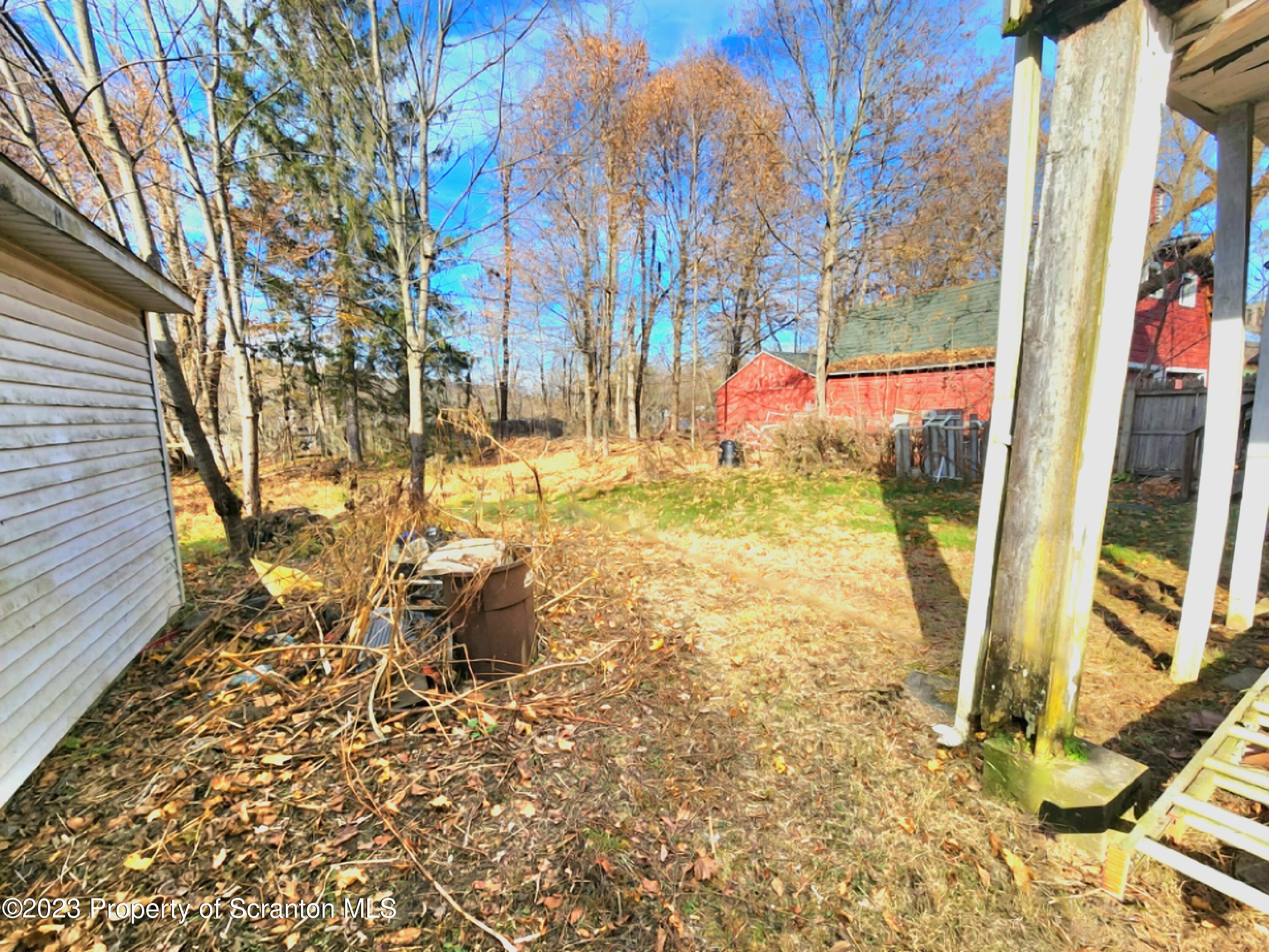 21 High Street Nicholson, PA 18446 - Photo 26 of 33 a backyard of a house with table and chairs
